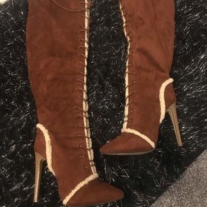 Over the knee tie up boots